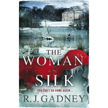 The Woman in Silk         {USED}